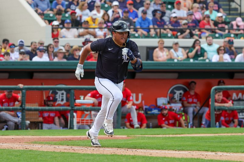 Feb 27, 2025; Lakeland, Florida, USA; Detroit Tigers second baseman Hao-Yu Lee (85) runs to first base during the fourth inning against the Boston Red Sox at Publix Field at Joker Marchant Stadium. Mandatory Credit: Mike Watters-Imagn Images