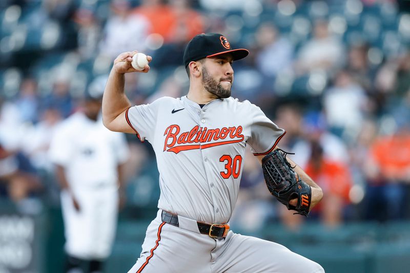 May 23, 2024; Chicago, Illinois, USA; Baltimore Orioles starting pitcher Grayson Rodriguez (30) delivers a pitch against the Chicago White Sox during the first inning at Guaranteed Rate Field. Mandatory Credit: Kamil Krzaczynski-USA TODAY Sports