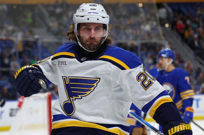 Nov 14, 2024; Buffalo, New York, USA;  St. Louis Blues left wing Brandon Saad (20) reacts after scoring a goal during the first period against the Buffalo Sabres at KeyBank Center. Mandatory Credit: Timothy T. Ludwig-Imagn Images