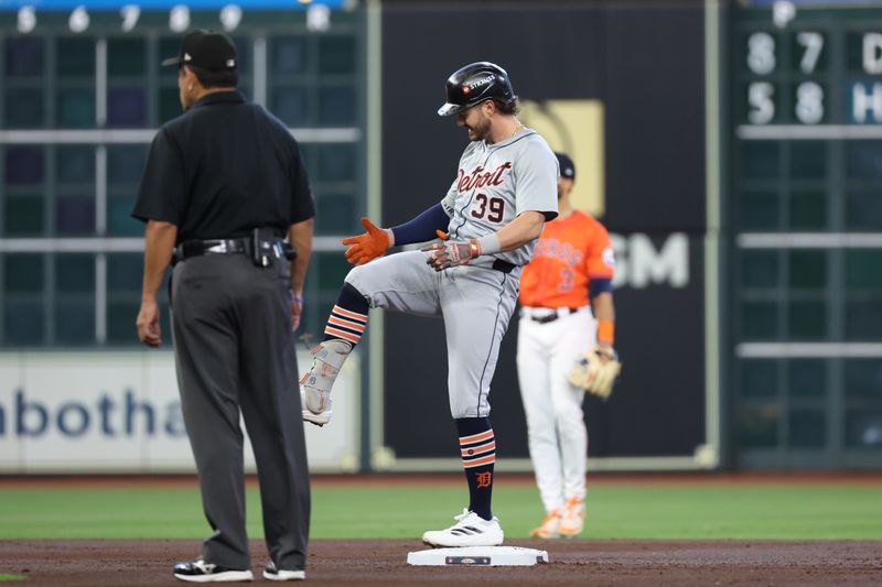 Oct 2, 2024; Houston, Texas, USA; Detroit Tigers shortstop Zach McKinstry (39) reacts after hitting a double against the Houston Astros during the second inning of game two of the Wildcard round for the 2024 MLB Playoffs at Minute Maid Park. Mandatory Credit: Thomas Shea-Imagn Images
