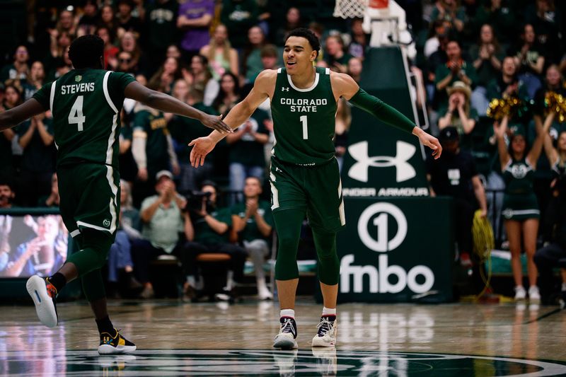 Mar 3, 2023; Fort Collins, Colorado, USA; Colorado State Rams guard John Tonje (1) reacts with guard Isaiah Stevens (4) in the second half against the New Mexico Lobos at Moby Arena. Mandatory Credit: Isaiah J. Downing-USA TODAY Sports