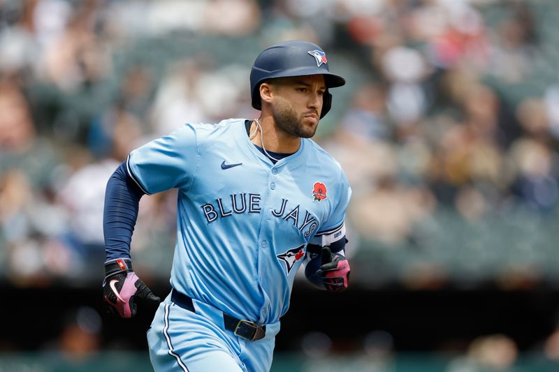 May 27, 2024; Chicago, Illinois, USA; Toronto Blue Jays outfielder George Springer (4) rounds the bases after hitting a two-run home run against the Chicago White Sox during the second inning at Guaranteed Rate Field. Mandatory Credit: Kamil Krzaczynski-USA TODAY Sports