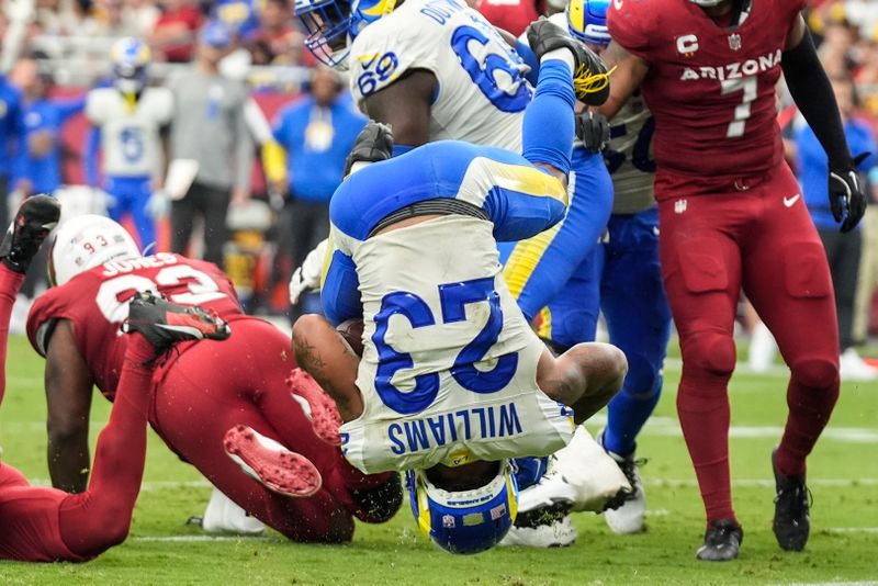 Los Angeles Rams running back Kyren Williams (23) scores a touchdown against the Arizona Cardinals during the second half of an NFL football game, Sunday, Sept. 15, 2024, in Glendale, Ariz. (AP Photo/Ross D. Franklin)