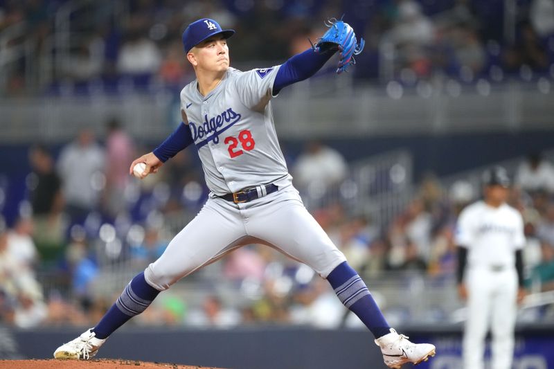 Sep 17, 2024; Miami, Florida, USA;  Los Angeles Dodgers starting pitcher Bobby Miller (28) pitches against the Miami Marlins in the first inning at loanDepot Park. Mandatory Credit: Jim Rassol-Imagn Images