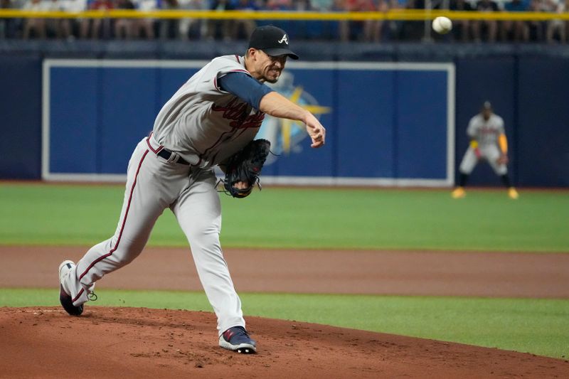 Jul 7, 2023; St. Petersburg, Florida, USA; Atlanta Braves starting pitcher Charlie Morton (50) throws a pitch against the Tampa Bay Rays during the first inning at Tropicana Field. Mandatory Credit: Dave Nelson-USA TODAY Sports