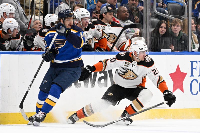 Mar 17, 2024; St. Louis, Missouri, USA; Anaheim Ducks right wing Brett Leason (20) skates against St. Louis Blues center Robert Thomas (18) during the first period at Enterprise Center. Mandatory Credit: Jeff Le-USA TODAY Sports