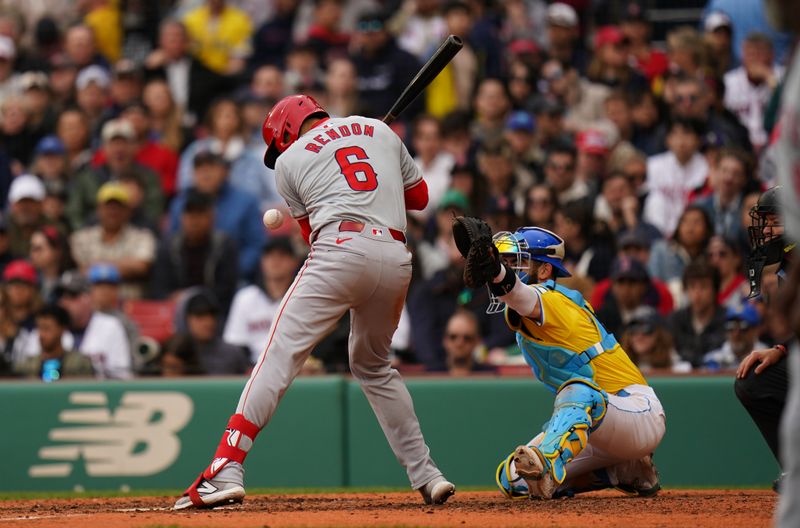 Apr 14, 2024; Boston, Massachusetts, USA; Los Angeles Angels third baseman Anthony Rendon (6) is hit by a pitch by the Boston Red Sox in the seventh inning at Fenway Park. Mandatory Credit: David Butler II-USA TODAY Sports