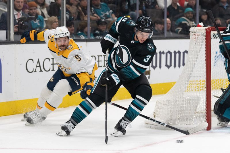 Feb 24, 2024; San Jose, California, USA; San Jose Sharks defenseman Henry Thrun (3) controls the puck away from Nashville Predators left wing Filip Forsberg (9) during the first period at SAP Center at San Jose. Mandatory Credit: Stan Szeto-USA TODAY Sports