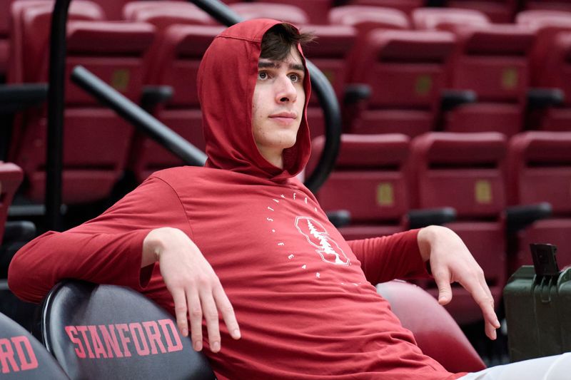 Jan 18, 2024; Stanford, California, USA; Stanford Cardinal forward Maxime Raynaud (42) sits on the bench before the game between the Stanford Cardinal and the Washington State Cougars at Maples Pavilion. Mandatory Credit: Robert Edwards-USA TODAY Sports