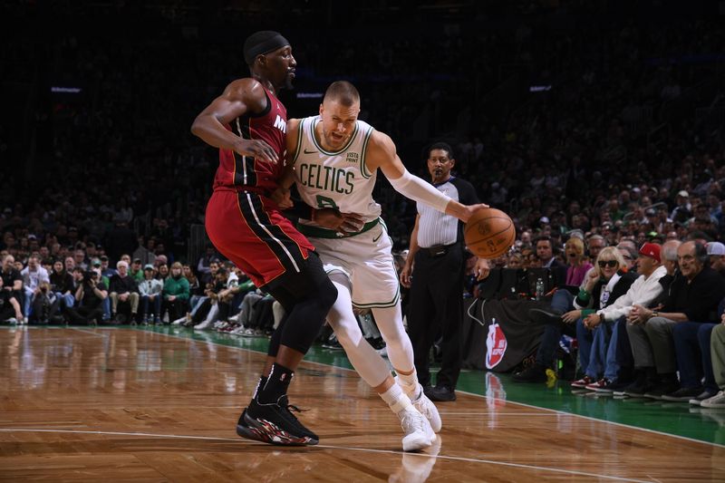 BOSTON, MA - APRIL 21: Kristaps Porzingis #8 of the Boston Celtics drives to the basket during the game against the Miami Heat during Round 1 Game 1 of the 2024 NBA Playoffs on April 21, 2024 at the TD Garden in Boston, Massachusetts. NOTE TO USER: User expressly acknowledges and agrees that, by downloading and or using this photograph, User is consenting to the terms and conditions of the Getty Images License Agreement. Mandatory Copyright Notice: Copyright 2024 NBAE  (Photo by Brian Babineau/NBAE via Getty Images)