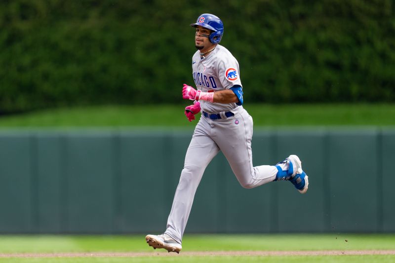 May 14, 2023; Minneapolis, Minnesota, USA; Chicago Cubs center fielder Christopher Morel (5) rounds second base after hitting a home run against Minnesota Twins starting pitcher Louie Varland (37) in the fourth inning at Target Field. Mandatory Credit: Matt Blewett-USA TODAY Sports