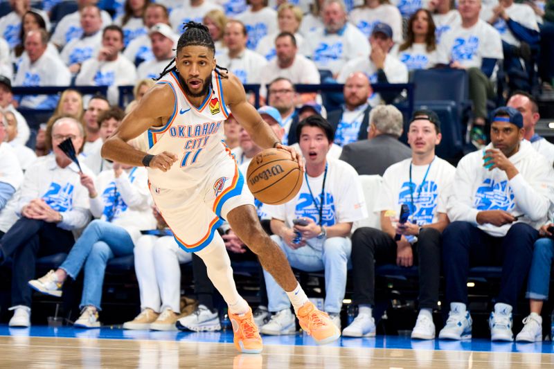 OKLAHOMA CITY, OKLAHOMA - APRIL 21: Isaiah Joe #11 of the Oklahoma City Thunder drives to the basket against the New Orleans Pelicans in game one of the Western Conference First Round Playoffs at the Paycom Center on April 21, 2024 in Oklahoma City, Oklahoma. NOTE TO USER: User expressly acknowledges and agrees that, by downloading and or using this photograph, User is consenting to the terms and conditions of the Getty Images License Agreement.  (Photo by Cooper Neill/Getty Images)