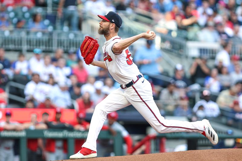 , toppicMay 6, 2025; Cumberland, Georgia, USA; Atlanta Braves pitcher Chris Sale (51) pitches against the Cincinnati Reds during the first inning at Truist Park. Mandatory Credit: Jordan Godfree-Imagn Images