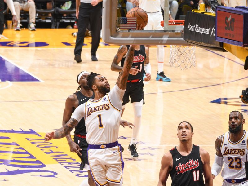 LOS ANGELES, CA - JANUARY 21:  D'Angelo Russell #1 of the Los Angeles Lakers goes to the basket during the game on January 21, 2024 at Crypto.Com Arena in Los Angeles, California. NOTE TO USER: User expressly acknowledges and agrees that, by downloading and/or using this Photograph, user is consenting to the terms and conditions of the Getty Images License Agreement. Mandatory Copyright Notice: Copyright 2024 NBAE (Photo by Juan Ocampo/NBAE via Getty Images)