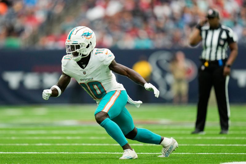 Miami Dolphins wide receiver Tyreek Hill runs a route against the Houston Texans during the first half of an NFL preseason football game, Saturday, Aug. 19, 2023, in Houston. (AP Photo/Eric Christian Smith)