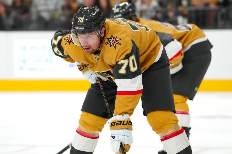 Oct 26, 2024; Las Vegas, Nevada, USA; Vegas Golden Knights left wing Tanner Pearson (70) awaits a face-off against the San Jose Sharks during the first period at T-Mobile Arena. Mandatory Credit: Stephen R. Sylvanie-Imagn Images