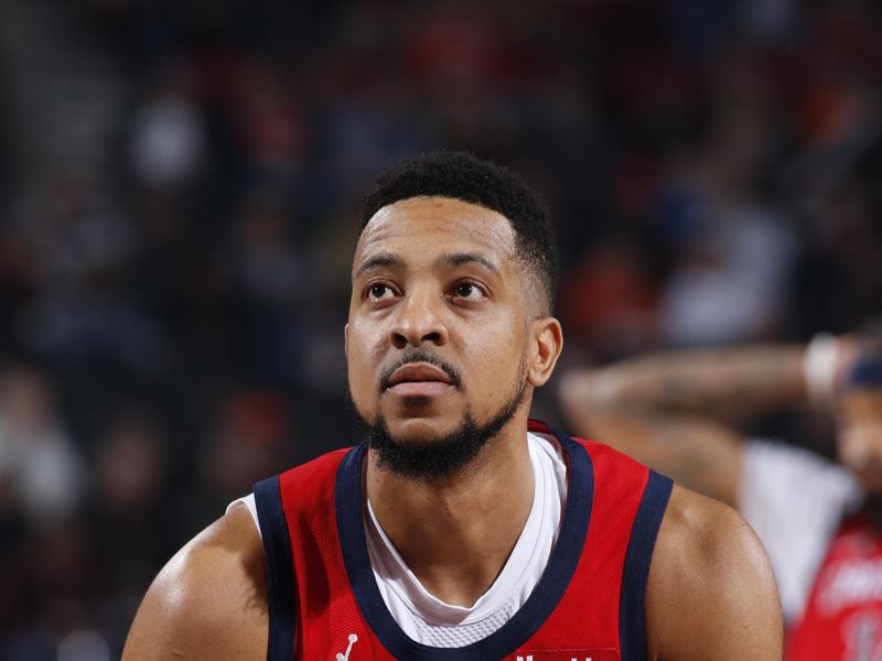 PORTLAND, OR - FEBRUARY 10: CJ McCollum #3 of the New Orleans Pelicans shoots a free throw during the game against the Portland Trail Blazers on February 10, 2024 at the Moda Center Arena in Portland, Oregon. NOTE TO USER: User expressly acknowledges and agrees that, by downloading and or using this photograph, user is consenting to the terms and conditions of the Getty Images License Agreement. Mandatory Copyright Notice: Copyright 2024 NBAE (Photo by Cameron Browne/NBAE via Getty Images)