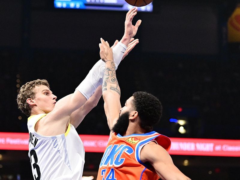 OKLAHOMA CITY, OKLAHOMA - DECEMBER 3: Lauri Markkanen #23 of the Utah Jazz puts up a shot in front of Kenrich Williams #34 of the Oklahoma City Thunder during the first half at Paycom Center on December 3, 2024 in Oklahoma City, Oklahoma. NOTE TO USER: User expressly acknowledges and agrees that, by downloading and or using this photograph, User is consenting to the terms and conditions of the Getty Images License Agreement. (Photo by Joshua Gateley/Getty Images)