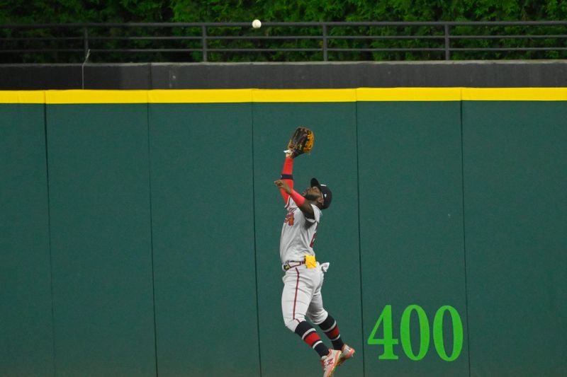 Jul 5, 2023; Cleveland, Ohio, USA; Atlanta Braves center fielder Michael Harris II (23) makes a leaping catch in the ninth inning against the Cleveland Guardians at Progressive Field. Mandatory Credit: David Richard-USA TODAY Sports