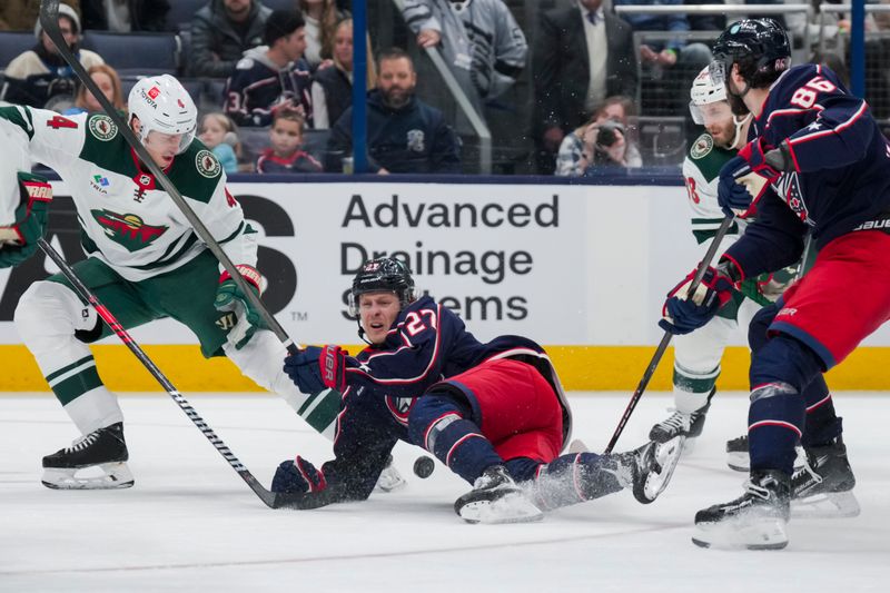 Jan 6, 2024; Columbus, Ohio, USA;  Columbus Blue Jackets defenseman Adam Boqvist (27) reacts as he is tripped by Minnesota Wild defenseman Jon Merrill (4) in the third period at Nationwide Arena. Mandatory Credit: Aaron Doster-USA TODAY Sports