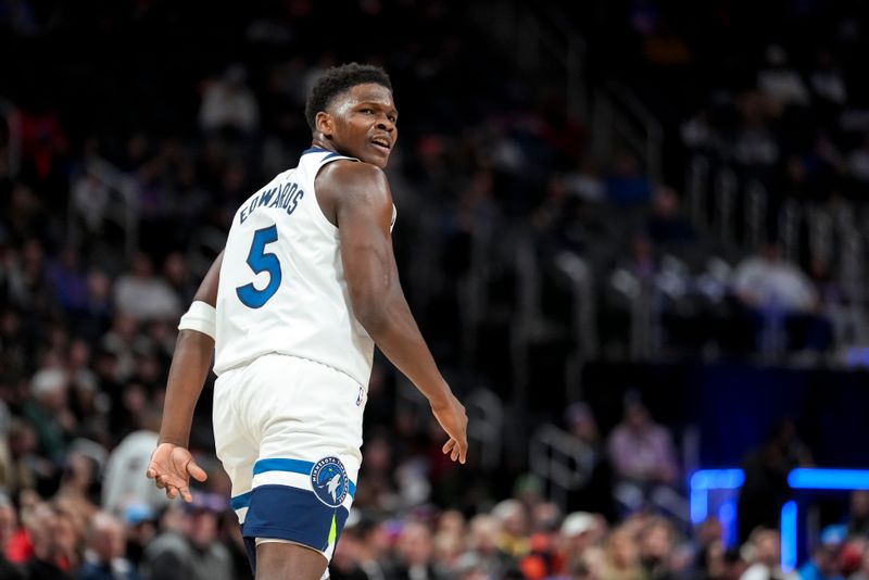 DETROIT, MICHIGAN - JANUARY 17: Anthony Edwards #5 of the Minnesota Timberwolves looks on against the Detroit Pistons at Little Caesars Arena on January 17, 2024 in Detroit, Michigan. NOTE TO USER: User expressly acknowledges and agrees that, by downloading and or using this photograph, User is consenting to the terms and conditions of the Getty Images License Agreement. (Photo by Nic Antaya/Getty Images)