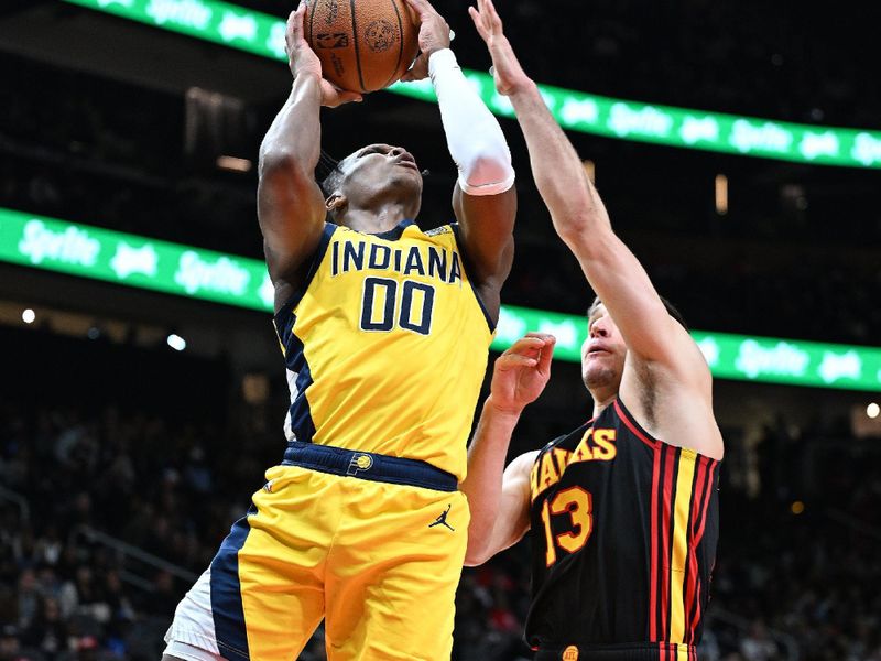 ATLANTA, GA - JANUARY 12: Bennedict Mathurin #00 of the Indiana Pacers shoots the ball during the game against the Atlanta Hawks on January 12, 2024 at State Farm Arena in Atlanta, Georgia.  NOTE TO USER: User expressly acknowledges and agrees that, by downloading and/or using this Photograph, user is consenting to the terms and conditions of the Getty Images License Agreement. Mandatory Copyright Notice: Copyright 2024 NBAE (Photo by Adam Hagy/NBAE via Getty Images)