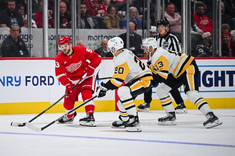 Oct 10, 2024; Detroit, Michigan, USA; Detroit Red Wings right wing Alex DeBrincat (93) controls the puck against Pittsburgh Penguins center Lars Eller (20) and right wing Kevin Hayes (13) during the second period at Little Caesars Arena. Mandatory Credit: Tim Fuller-Imagn Images