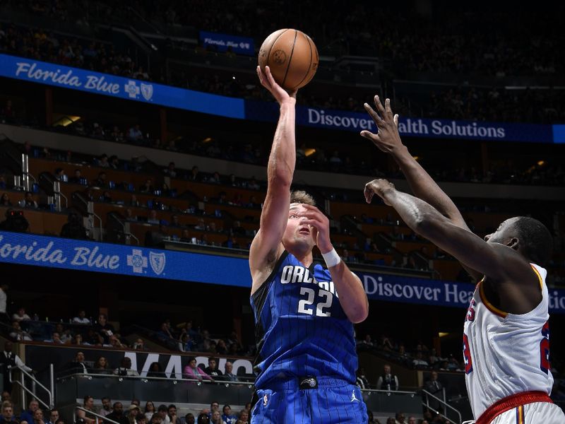 ORLANDO, FL - FEBRUARY 27:  Franz Wagner #22 of the Orlando Magic shoots the ball during the game against the Golden State Warriors on February 27, 2025 at Kia Center in Orlando, Florida. NOTE TO USER: User expressly acknowledges and agrees that, by downloading and or using this photograph, User is consenting to the terms and conditions of the Getty Images License Agreement. Mandatory Copyright Notice: Copyright 2025 NBAE (Photo by Fernando Medina/NBAE via Getty Images)