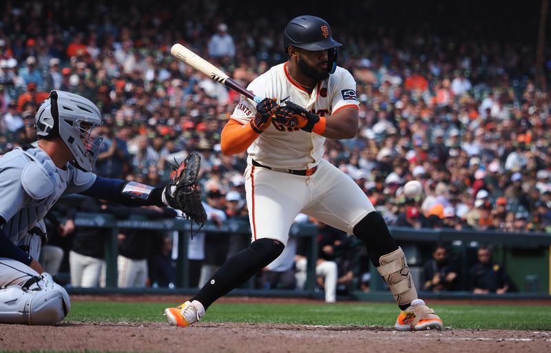 Aug 11, 2024; San Francisco, California, USA; San Francisco Giants center fielder Heliot Ramos (17) strikes out looking ahead of Detroit Tigers catcher Dillon Dingler (38) during the ninth inning at Oracle Park. Mandatory Credit: Kelley L Cox-USA TODAY Sports