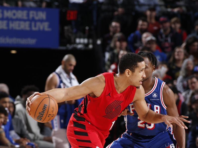 PORTLAND, OR - JANUARY 29: Malcolm Brogdon #11 of the Portland Trail Blazers handles the ball during the game against the Philadelphia 76ers on January 29, 2024 at the Moda Center Arena in Portland, Oregon. NOTE TO USER: User expressly acknowledges and agrees that, by downloading and or using this photograph, user is consenting to the terms and conditions of the Getty Images License Agreement. Mandatory Copyright Notice: Copyright 2024 NBAE (Photo by Cameron Browne/NBAE via Getty Images)