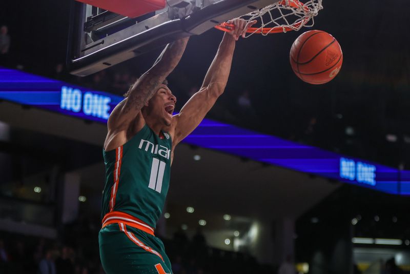 Jan 4, 2023; Atlanta, Georgia, USA; Miami Hurricanes guard Jordan Miller (11) dunks against the Georgia Tech Yellow Jackets in the first half at McCamish Pavilion. Mandatory Credit: Brett Davis-USA TODAY Sports