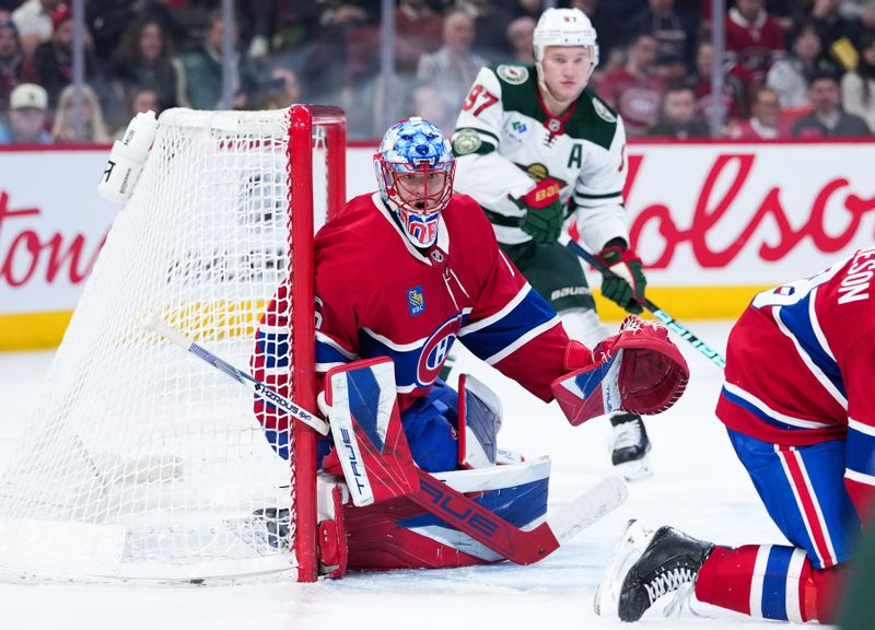 Jan 20, 2026; Montreal, Quebec, CAN;Montreal Canadiens goalie Jakub Dobes (75) tracks the puck and Minnesota Wild forward Kirill Kaprizov (97) waits for a pass during the third period at the Bell Centre. Mandatory Credit: Eric Bolte-Imagn Images