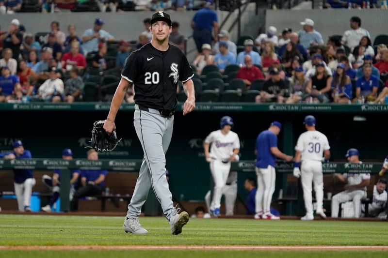 Jul 22, 2024; Arlington, Texas, USA; Chicago White Sox starting pitcher Erick Fedde (20) walks off the field after being taken out of the game during the seventh inning against the Texas Rangers at Globe Life Field. Mandatory Credit: Raymond Carlin III-USA TODAY Sports