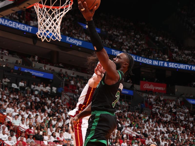 MIAMI, FL - APRIL 27: Jaylen Brown #7 of the Boston Celtics shoots the ball during the game against the Miami Heat during Round 1 Game 3 of the 2024 NBA Playoffs on April 27, 2024 at Kaseya Center in Miami, Florida. NOTE TO USER: User expressly acknowledges and agrees that, by downloading and or using this Photograph, user is consenting to the terms and conditions of the Getty Images License Agreement. Mandatory Copyright Notice: Copyright 2024 NBAE (Photo by Issac Baldizon/NBAE via Getty Images)