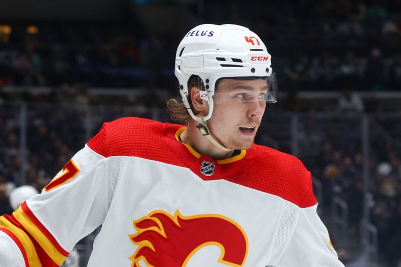 Dec 23, 2023; Los Angeles, California, USA; Calgary Flames center Connor Zary (47) looks on during the third period of a game against the Los Angeles Kings at Crypto.com Arena. Mandatory Credit: Jessica Alcheh-USA TODAY Sports