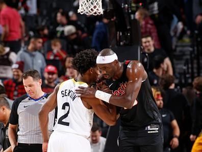 PORTLAND, OR - DECEMBER 14:  Colin Sexton #2 of the Utah Jazz & Duop Reath #26 of the Portland Trail Blazers embrace after the game on December 14, 2023 at the Moda Center Arena in Portland, Oregon. NOTE TO USER: User expressly acknowledges and agrees that, by downloading and or using this photograph, user is consenting to the terms and conditions of the Getty Images License Agreement. Mandatory Copyright Notice: Copyright 2023 NBAE (Photo by Cameron Browne/NBAE via Getty Images)