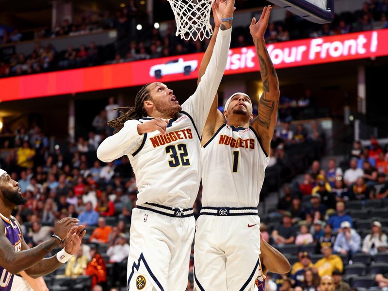 DENVER, COLORADO - OCTOBER 13: Aaron Gordon #32  and Michael Porter Jr. of the Denver Nuggets attack the rim against the Phoenix Suns at Ball Arena on October 13, 2024 in Denver, Colorado. NOTE TO USER: User expressly acknowledges and agrees that, by downloading and/or using this Photograph, user is consenting to the terms and conditions of the Getty Images License Agreement. (Photo by Jamie Schwaberow/Getty Images)