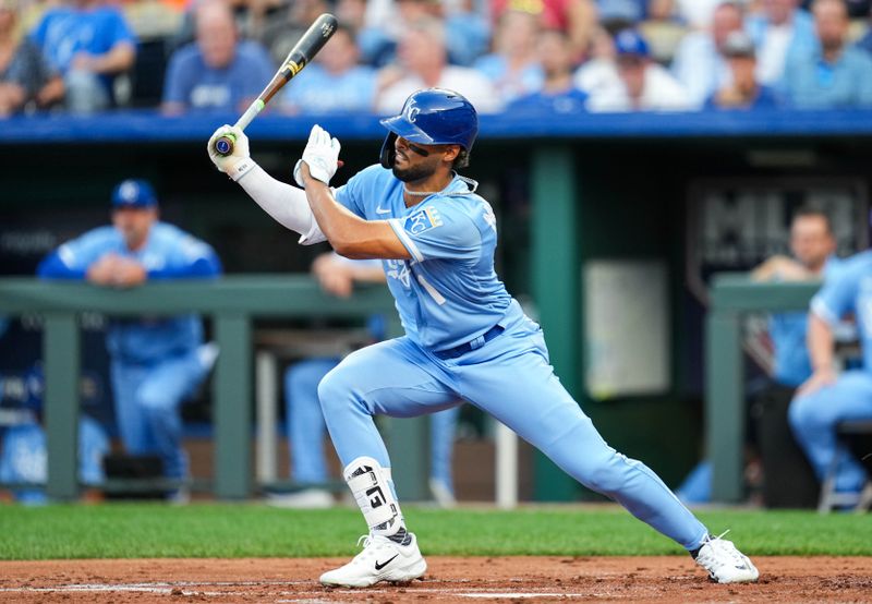 Aug 11, 2023; Kansas City, Missouri, USA; Kansas City Royals left fielder MJ Melendez (1) hits an RBI double  during the first inning against the St. Louis Cardinals at Kauffman Stadium. Mandatory Credit: Jay Biggerstaff-USA TODAY Sports