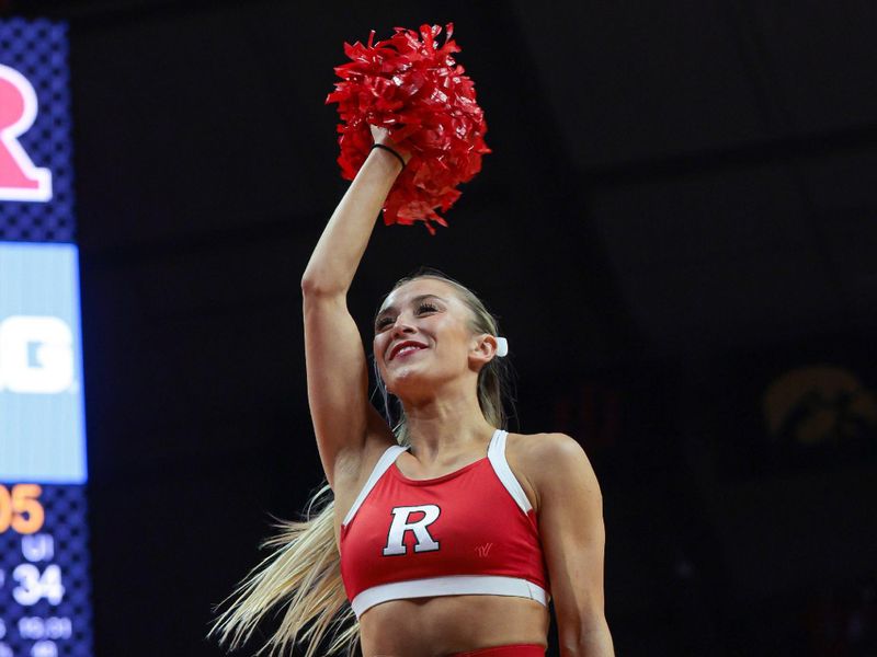 Dec 2, 2023; Piscataway, New Jersey, USA; Rutgers Scarlet Knights cheer squad members perform during the first half against the Illinois Fighting Illini at Jersey Mike's Arena. Mandatory Credit: Vincent Carchietta-USA TODAY Sports