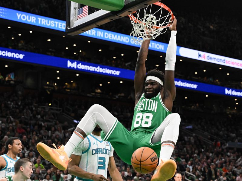 BOSTON, MASSACHUSETTS - APRIL 12: Neemias Queta #88 of the Boston Celtics dunks and scores against the Charlotte Hornets during the second quarter at the TD Garden on April 12, 2024 in Boston, Massachusetts. NOTE TO USER: User expressly acknowledges and agrees that, by downloading and or using this photograph, User is consenting to the terms and conditions of the Getty Images License Agreement. (Photo by Brian Fluharty/Getty Images)