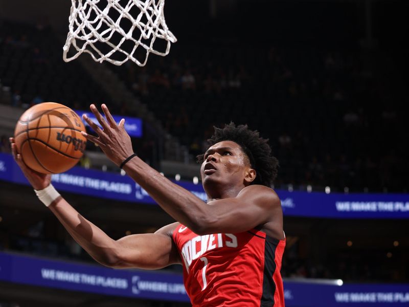 SALT LAKE CITY, UT - OCTOBER 7: Amen Thompson #1 of the Houston Rockets drives to the basket during the game against the Utah Jazz during a NBA preseason game on October 7, 2024 at the Delta Center in Salt Lake City, Utah. NOTE TO USER: User expressly acknowledges and agrees that, by downloading and or using this Photograph, User is consenting to the terms and conditions of the Getty Images License Agreement. Mandatory Copyright Notice: Copyright 2024 NBAE (Photo by Melissa Majchrzak/NBAE via Getty Images)