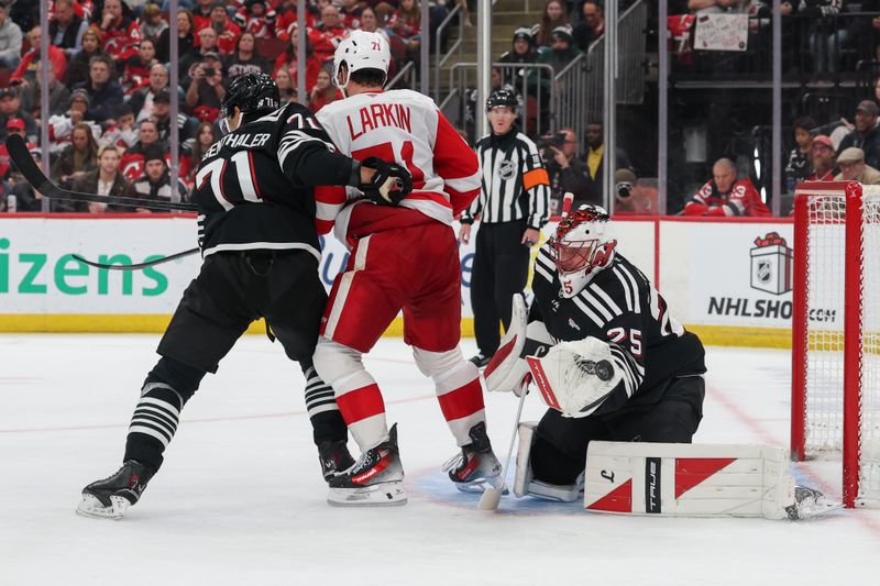 Nov 24, 2025; Newark, New Jersey, USA; New Jersey Devils goaltender Jacob Markstrom (25) makes a save against the Detroit Red Wings during the third period at Prudential Center. Mandatory Credit: Ed Mulholland-Imagn Images