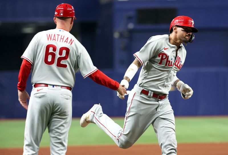 Jul 5, 2023; St. Petersburg, Florida, USA; Philadelphia Phillies right fielder Nick Castellanos (8) is congratulated  by third base coach Dusty Wathan (62) after hitting a home run against the Tampa Bay Rays during the sixth inning at Tropicana Field. Mandatory Credit: Kim Klement-USA TODAY Sports