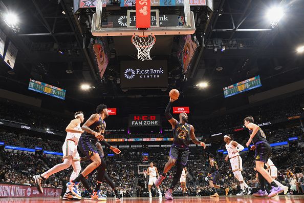 SAN ANTONIO, TX - DECEMBER 15:  LeBron James #23 of the Los Angeles Lakers grabs the rebound during the game  on December 15, 2023 at the Frost Bank Center in San Antonio, Texas. NOTE TO USER: User expressly acknowledges and agrees that, by downloading and or using this photograph, user is consenting to the terms and conditions of the Getty Images License Agreement. Mandatory Copyright Notice: Copyright 2023 NBAE (Photos by Andrew D. Bernstein/NBAE via Getty Images)