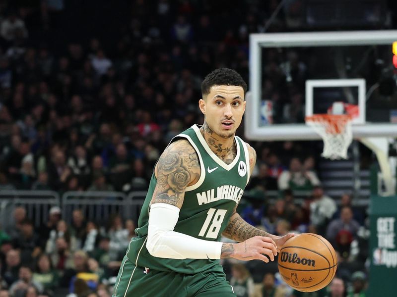 MILWAUKEE, WISCONSIN - FEBRUARY 09: Kyle Kuzma #18 of the Milwaukee Bucks handles the ball during a game against the Philadelphia 76ers at Fiserv Forum on February 09, 2025 in Milwaukee, Wisconsin. NOTE TO USER: User expressly acknowledges and agrees that, by downloading and or using this photograph, User is consenting to the terms and conditions of the Getty Images License Agreement. (Photo by Stacy Revere/Getty Images)