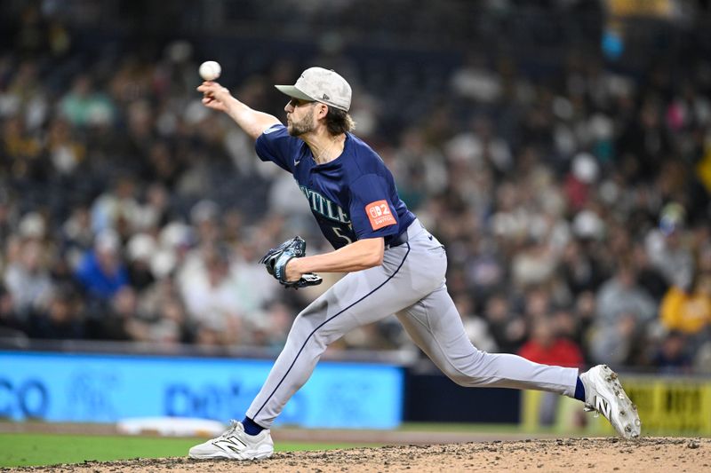 May 16, 2025; San Diego, California, USA; Seattle Mariners relief pitcher Collin Snider (52) delivers during the ninth inning against the San Diego Padres at Petco Park. Mandatory Credit: Denis Poroy-Imagn Images