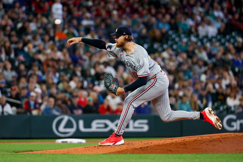 May 31, 2025; Seattle, Washington, USA; Minnesota Twins starting pitcher Bailey Ober (17) throws against the Seattle Mariners during the first inning at T-Mobile Park. Mandatory Credit: Joe Nicholson-Imagn Images