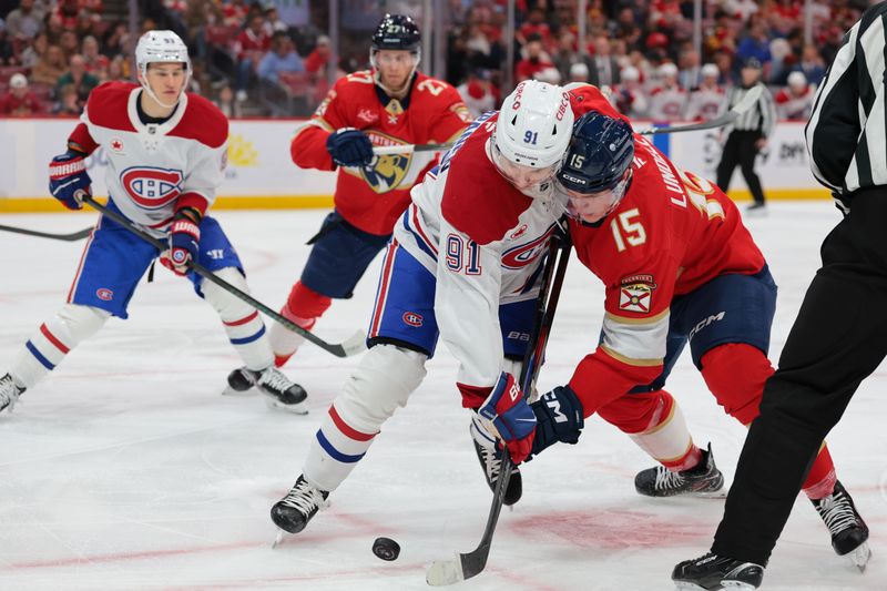 Dec 30, 2025; Sunrise, Florida, USA; Florida Panthers center Anton Lundell (15) and Montreal Canadiens center Oliver Kapanen (91) face off during the first period at Amerant Bank Arena. Mandatory Credit: Sam Navarro-Imagn Images