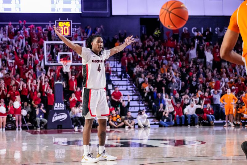 Jan 13, 2024; Athens, Georgia, USA; Georgia Bulldogs guard Silas Demary Jr. (4) reacts after making a three point basket against the Tennessee Volunteers during the second half at Stegeman Coliseum. Mandatory Credit: Dale Zanine-USA TODAY Sports