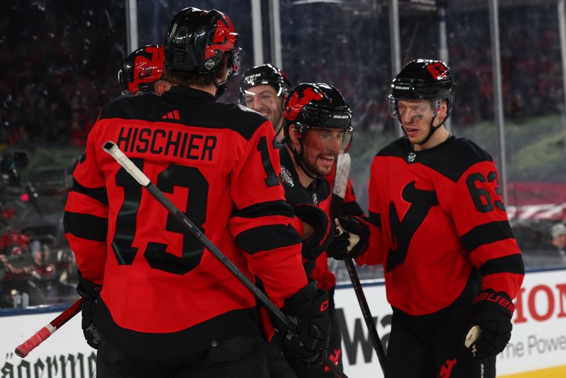 Feb 17, 2024; East Rutherford, New Jersey, USA; New Jersey Devils defenseman Brendan Smith (2) celebrates his goal against the Philadelphia Flyers during the second period in a Stadium Series ice hockey game at MetLife Stadium. Mandatory Credit: Ed Mulholland-USA TODAY Sports